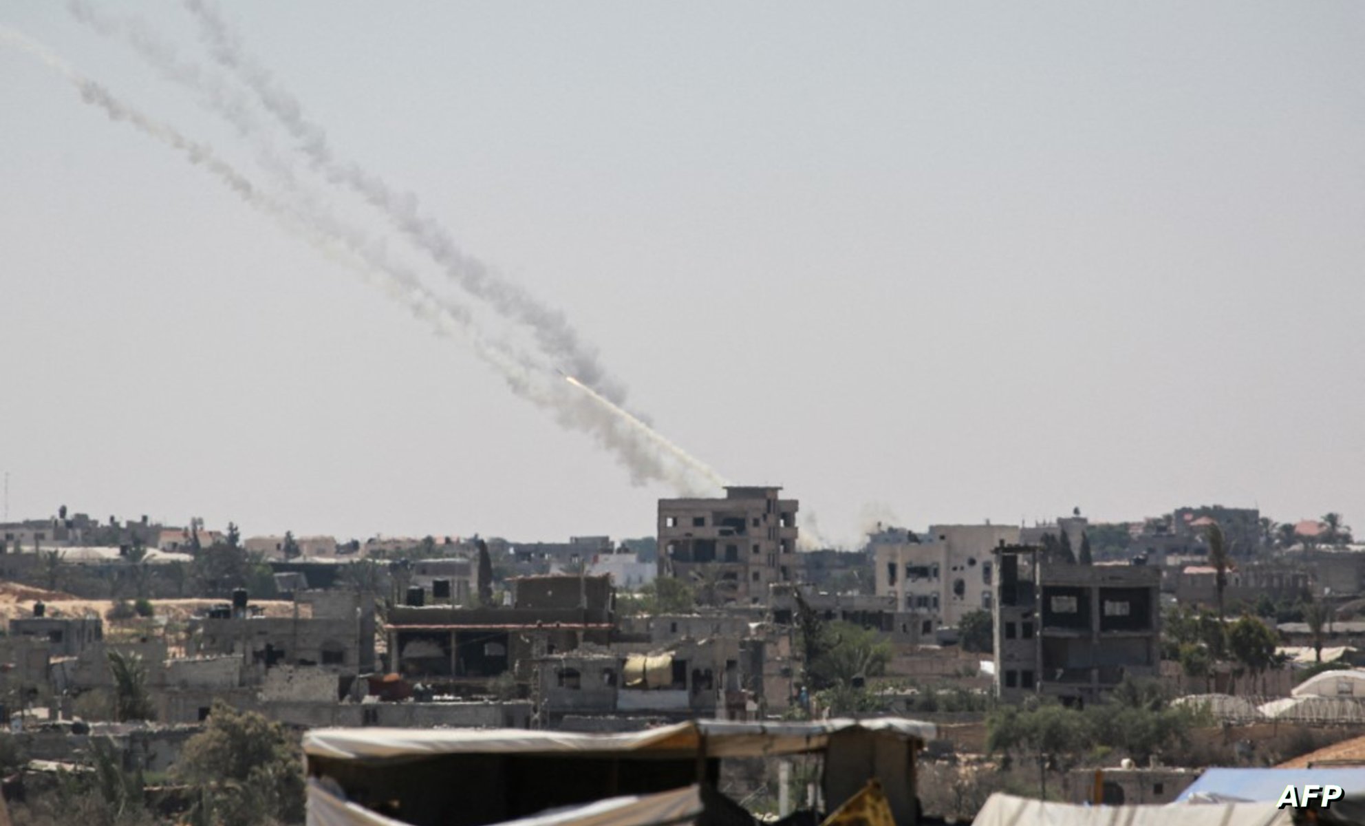 Rockets are fired from Khan Yunis in the southern Gaza Strip towards Israel on August 5, 2024, amid the ongoing conflict between Israel and the Palestinian Hamas militant group. (Photo by Bashar TALEB / AFP)