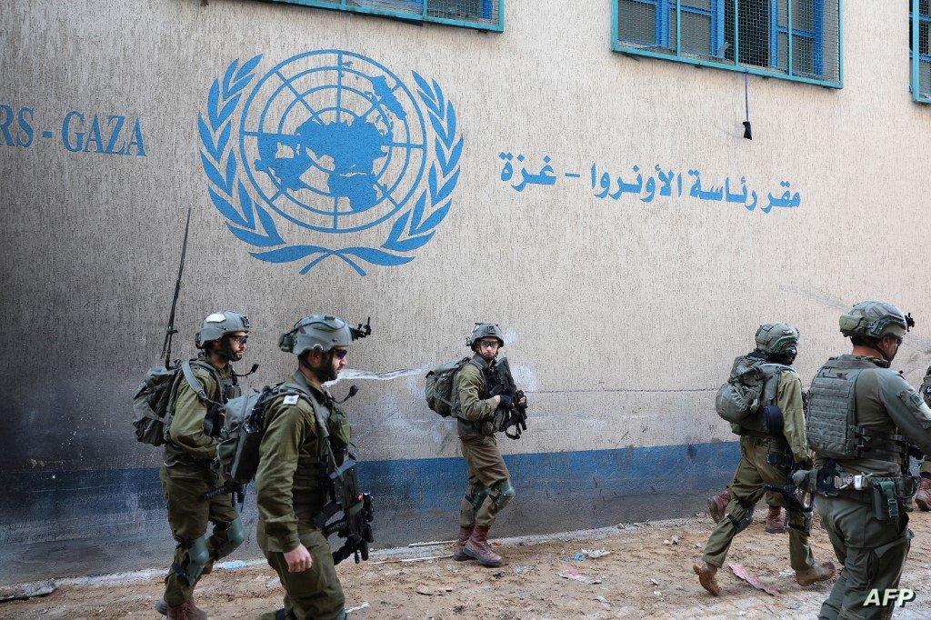 –PHOTO TAKEN DURING A CONTROLLED TOUR AND SUBSEQUENTLY EDITED UNDER THE SUPERVISION OF THE ISRAELI MILITARY– This picture taken during a media tour organised by the Israeli army on February 8, 2024, shows Israeli soldiers inside an evacuated compound of the United Nations Relief and Works Agency for Palestine Refugees (UNRWA) in Gaza City, amid ongoing fighting between Israel and the Palestinian militant group Hamas. (Photo by JACK GUEZ / AFP)