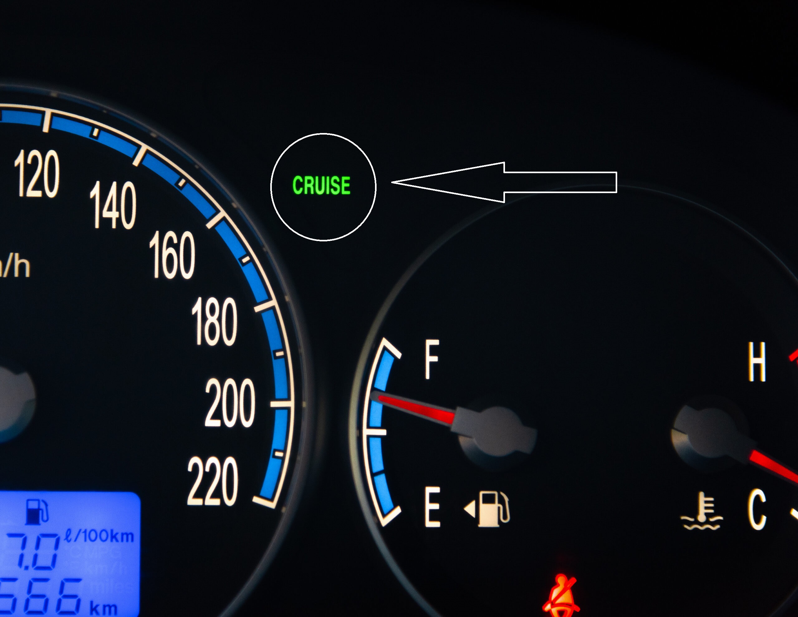 Close up of the cruise control light of a modern SUV