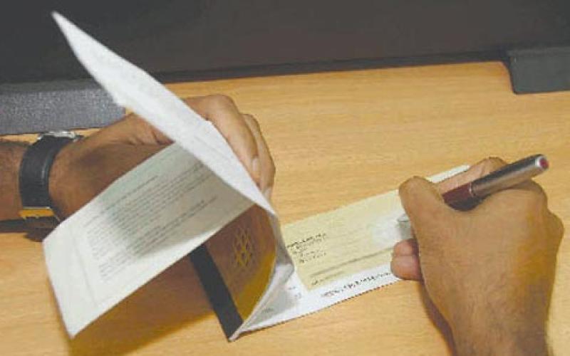 15 ألف شيك مرتجع الشهر الماضي بقيمة 80 مليون دينار