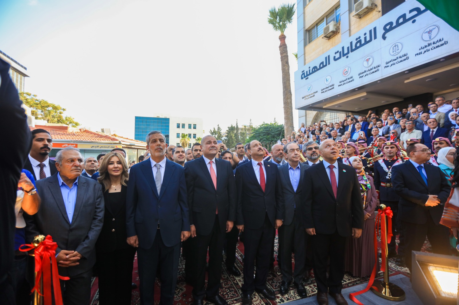 مجمع النقابات يدشن سارية العلم والجدارية الهاشمية ويحدث بنيته التحتية